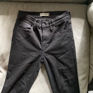 Madewell roadtripper black jeans with raw seam size 25
